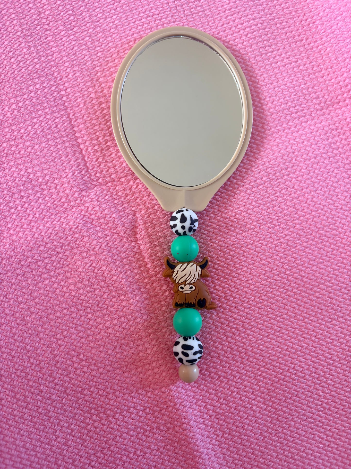 Beaded mirror