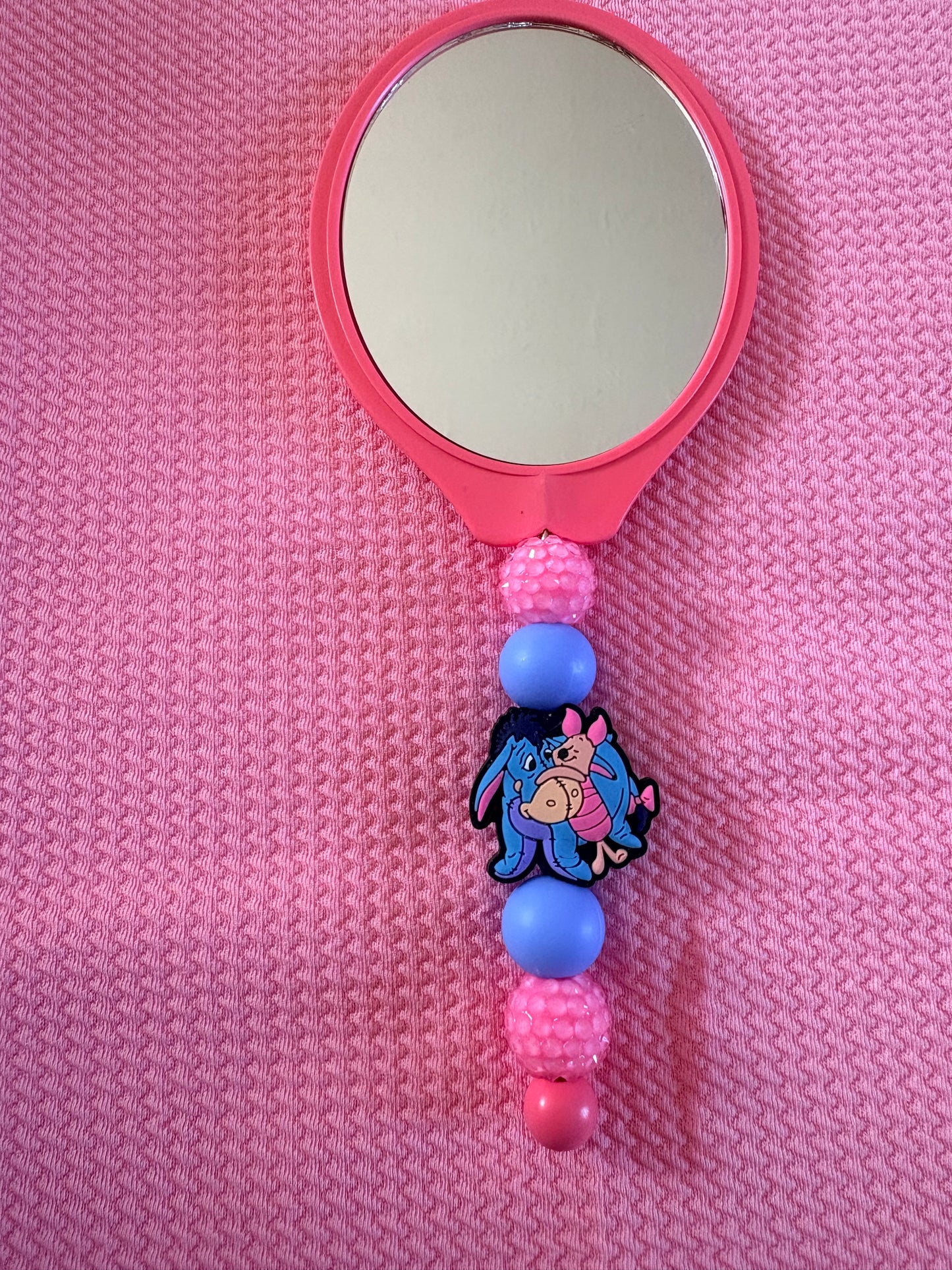 Beaded mirror